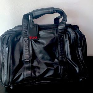 Tum leather travel bag